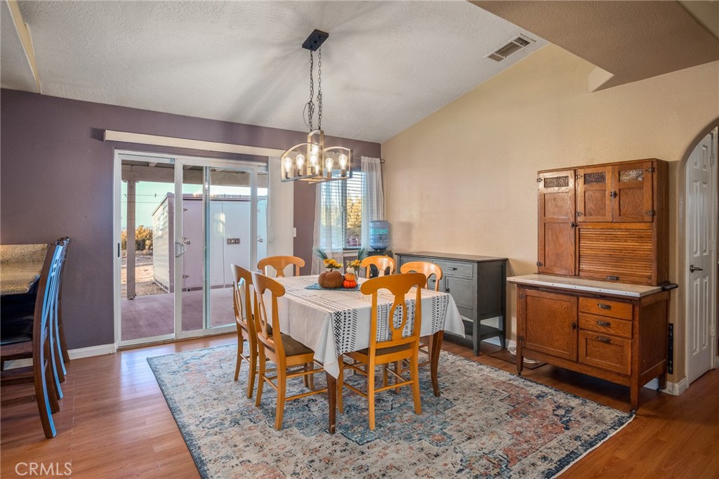388 Calaveras Road Pinon Hills, CA 92372 - Photo 8 of 44 a view of a dining room with furniture