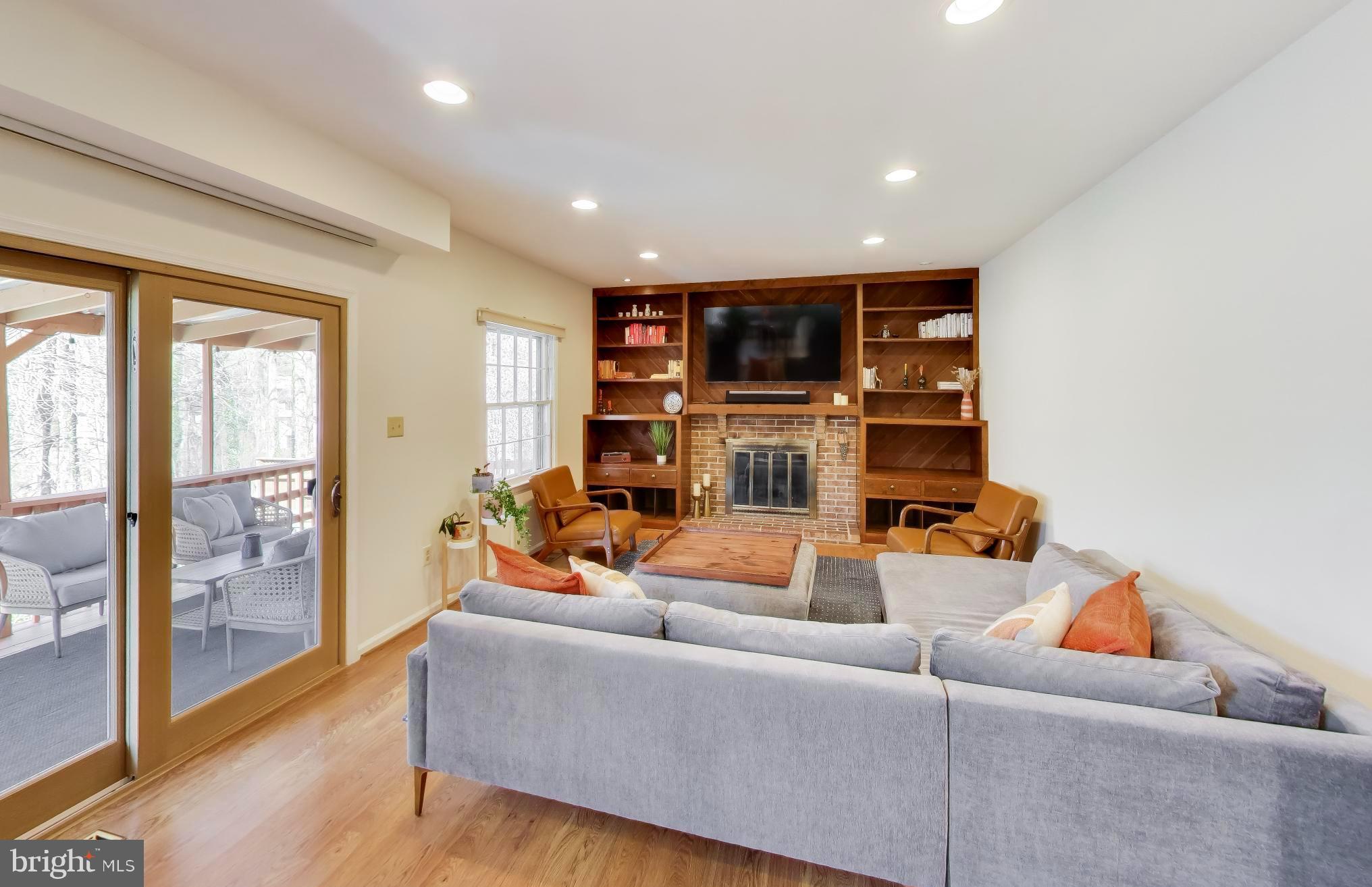 10150 Red Spruce Road Fairfax, VA 22032 - Photo 16 of 70 Family Room Opens onto a Lovely Covered Deck