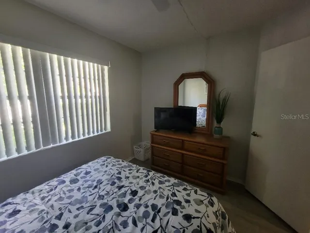 a kitchen with a stove and cabinets
