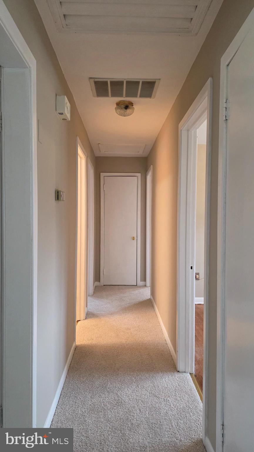 6125 Fishers Station Road Lothian, MD 20711 - Photo 9 of 23 a view of hallway with window