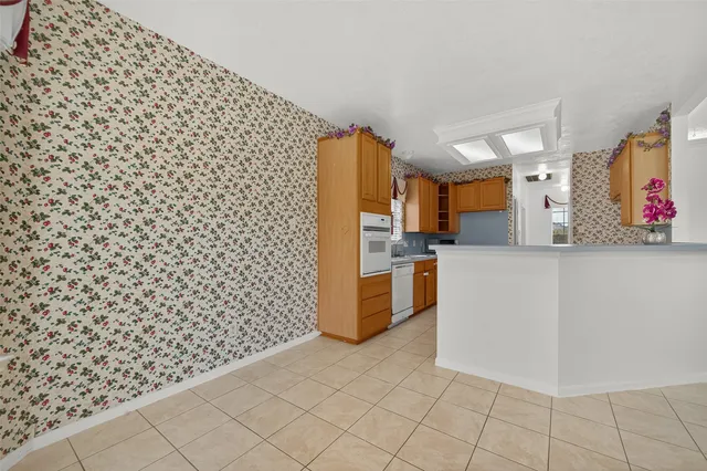 a kitchen with a cabinets and a stove
