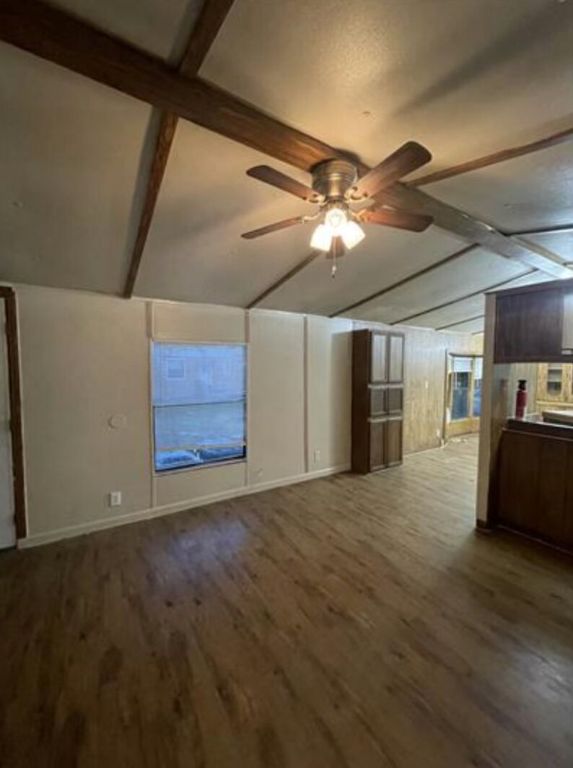 410 North Street Kyle, TX 78640 - Photo 2 of 7 a view of a livingroom with a ceiling fan
