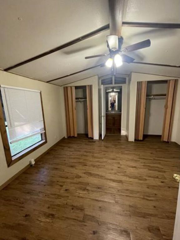 410 North Street Kyle, TX 78640 - Photo 7 of 7 a view of a livingroom with wooden floor and chandelier
