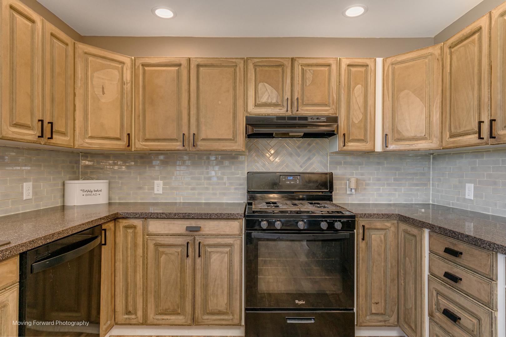 163 Chicago Road Paw Paw, IL 61353 - Photo 11 of 35 a kitchen with granite countertop a stove a sink and cabinets