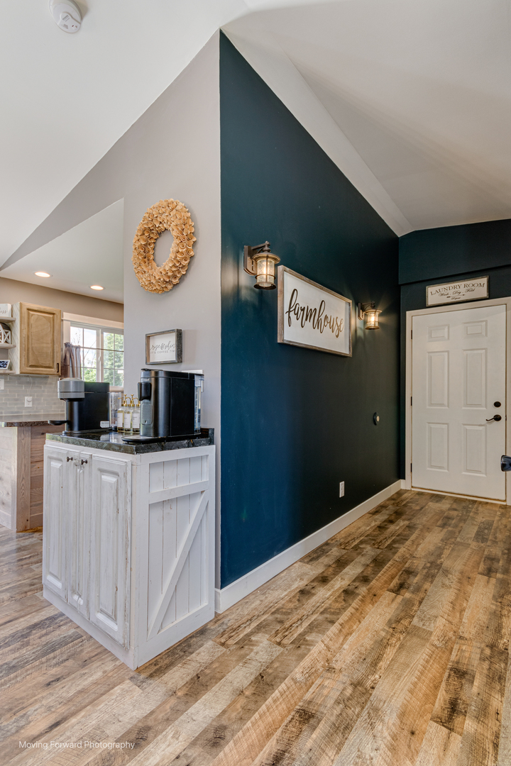 163 Chicago Road Paw Paw, IL 61353 - Photo 8 of 35 a view of kitchen with cabinets and outdoor space
