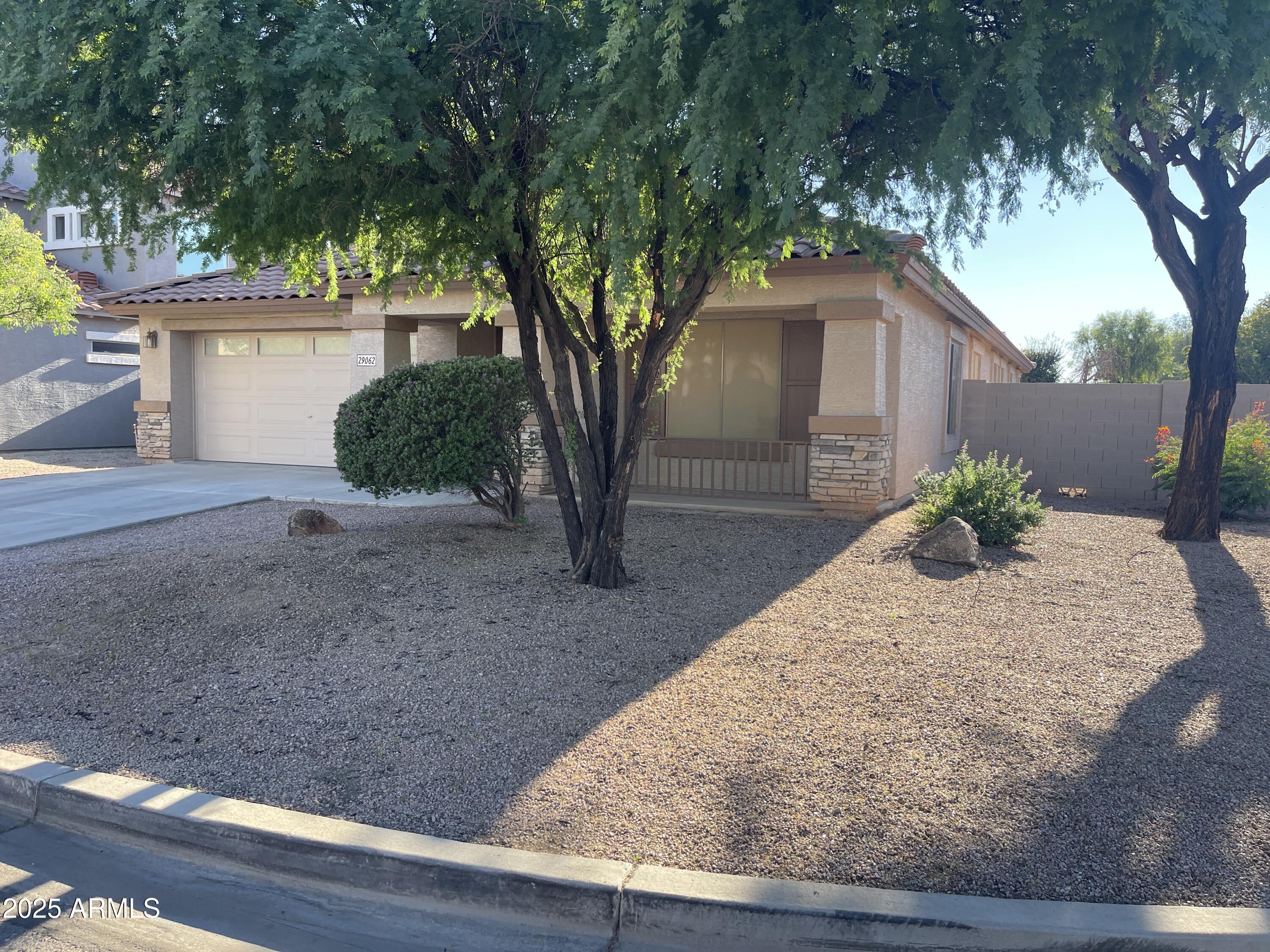 29062 North Mountain View Road San Tan Valley, AZ 85143 - Photo 15 of 16 a view of a backyard of the house