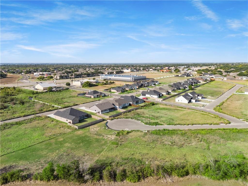 10912 Granada Drive Waco, TX 76708 - Photo 5 of 9 an aerial view of residential houses with outdoor space and trees