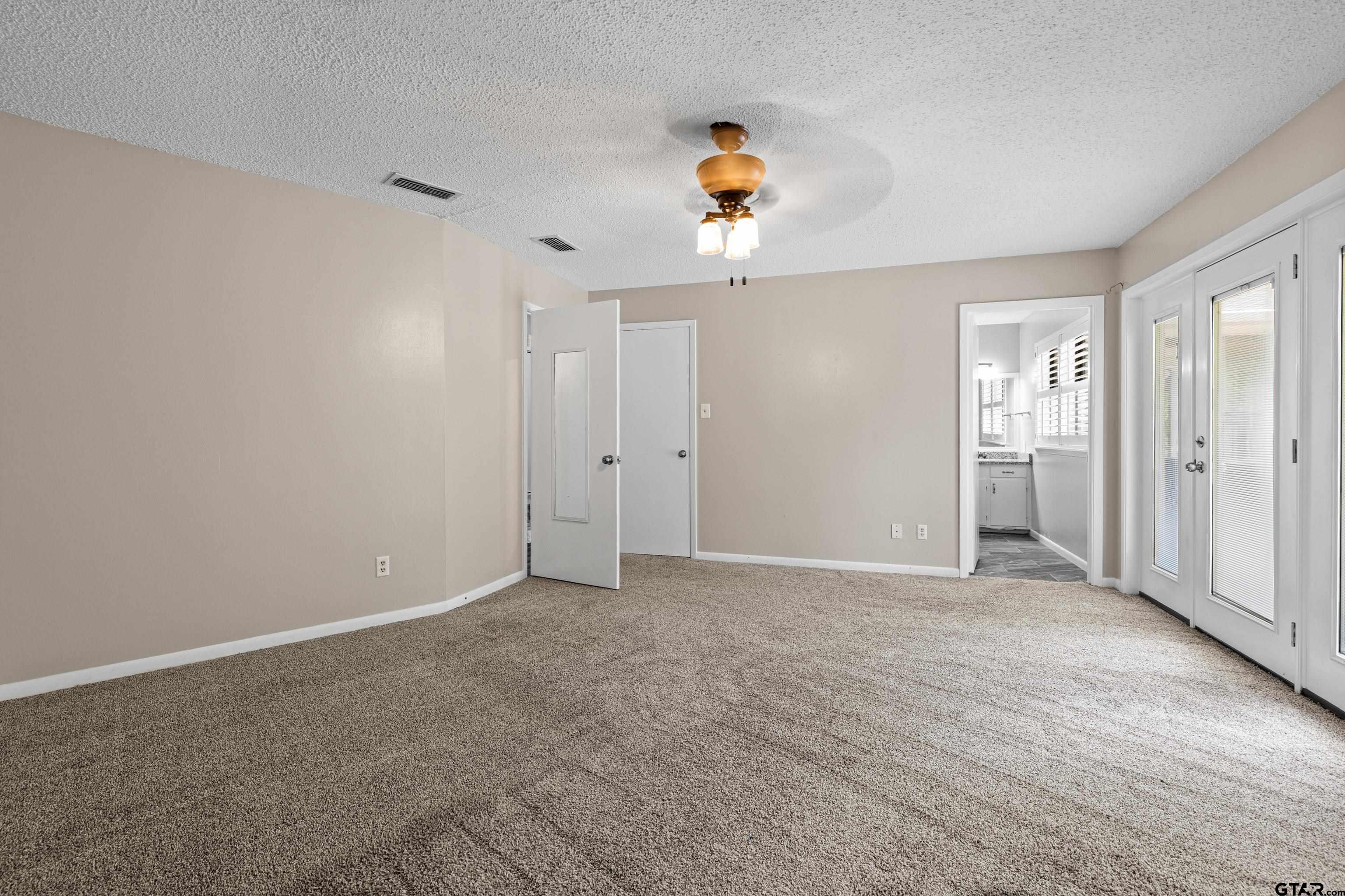 1821 Azalea Street Gilmer, TX 75644 - Photo 15 of 34 wooden floor in an empty room
