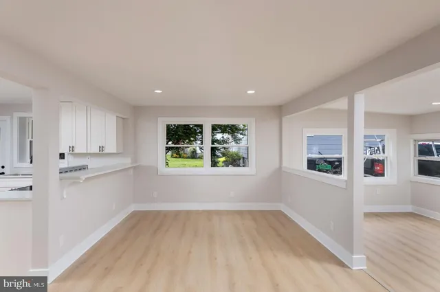 an empty room with windows