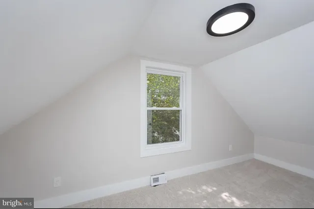 a view of a bathroom with toilet