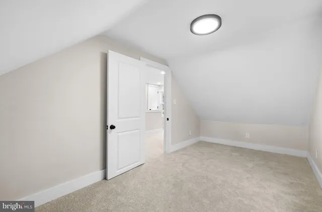 a terrace with wooden floor and city view
