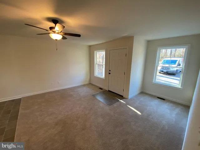 a view of a livingroom with a fan