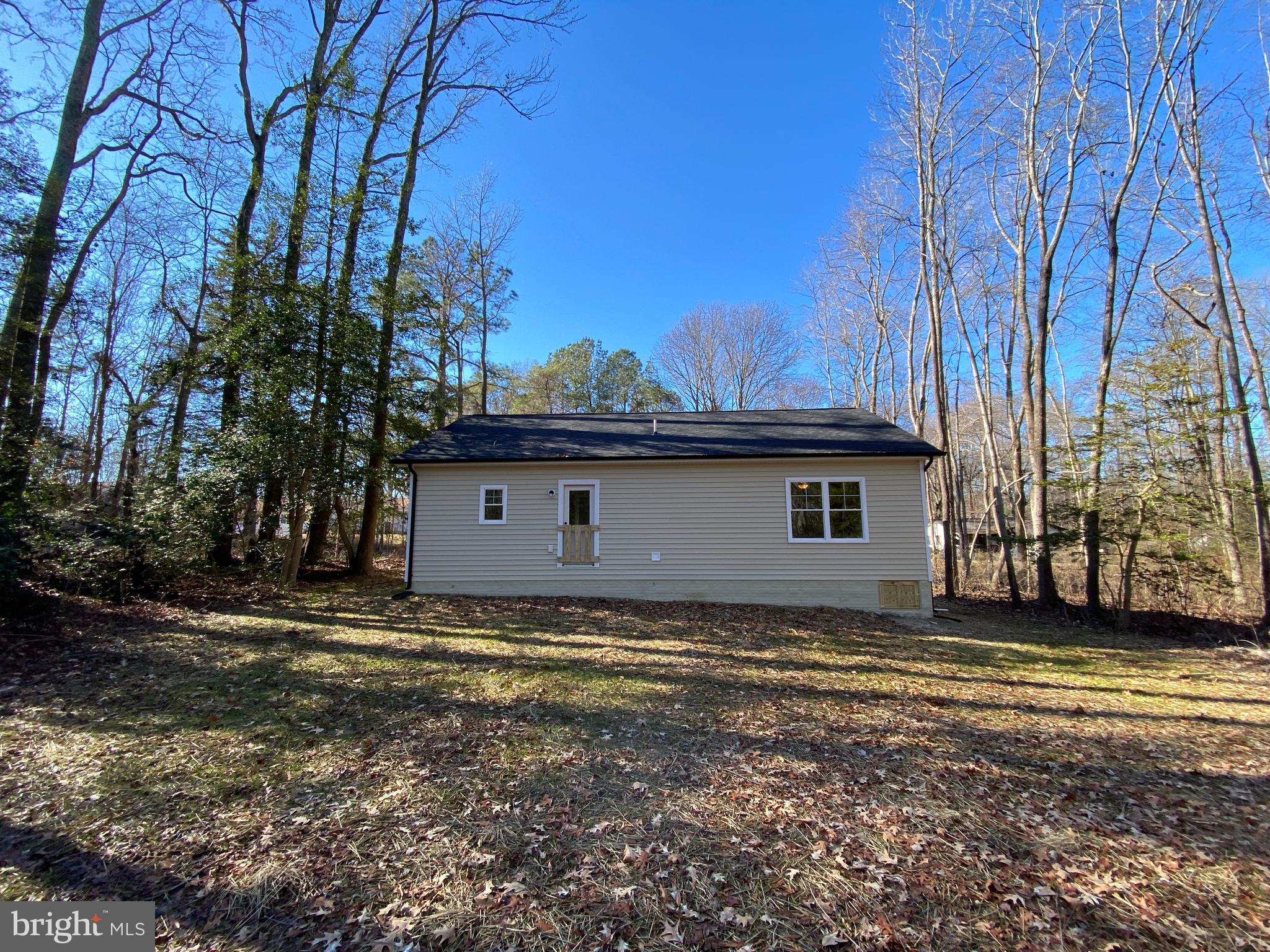 170 Forest Grove Road Colonial Beach, VA 22443 - Photo 4 of 34 a view of a house with a yard