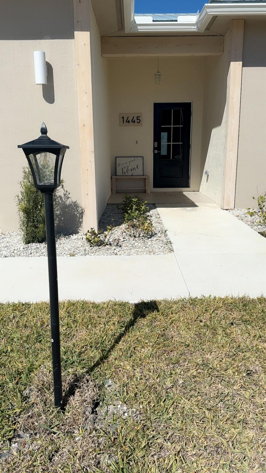 1445 Southeast 23rd Street Okeechobee, FL 34974 - Photo 11 of 11 a view of a door of the house