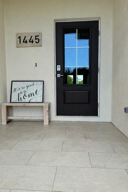 1445 Southeast 23rd Street Okeechobee, FL 34974 - Photo 2 of 11 a bathroom with a bathtub and a sink