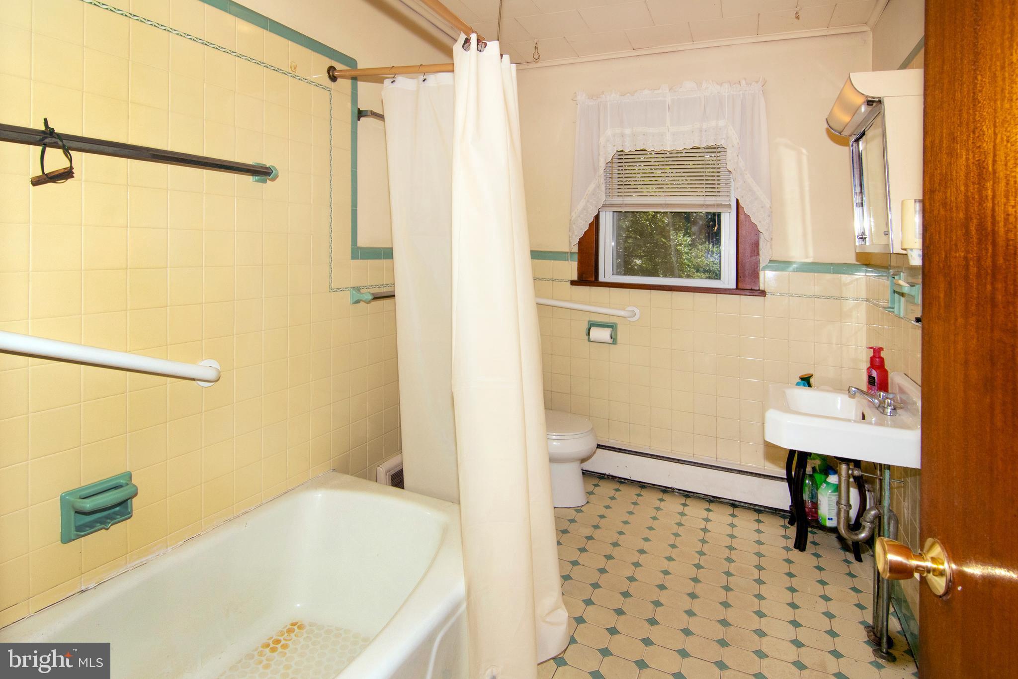 266 Passaic Avenue Thorofare, NJ 08086 - Photo 23 of 53 a bathroom with a bathtub and a shower