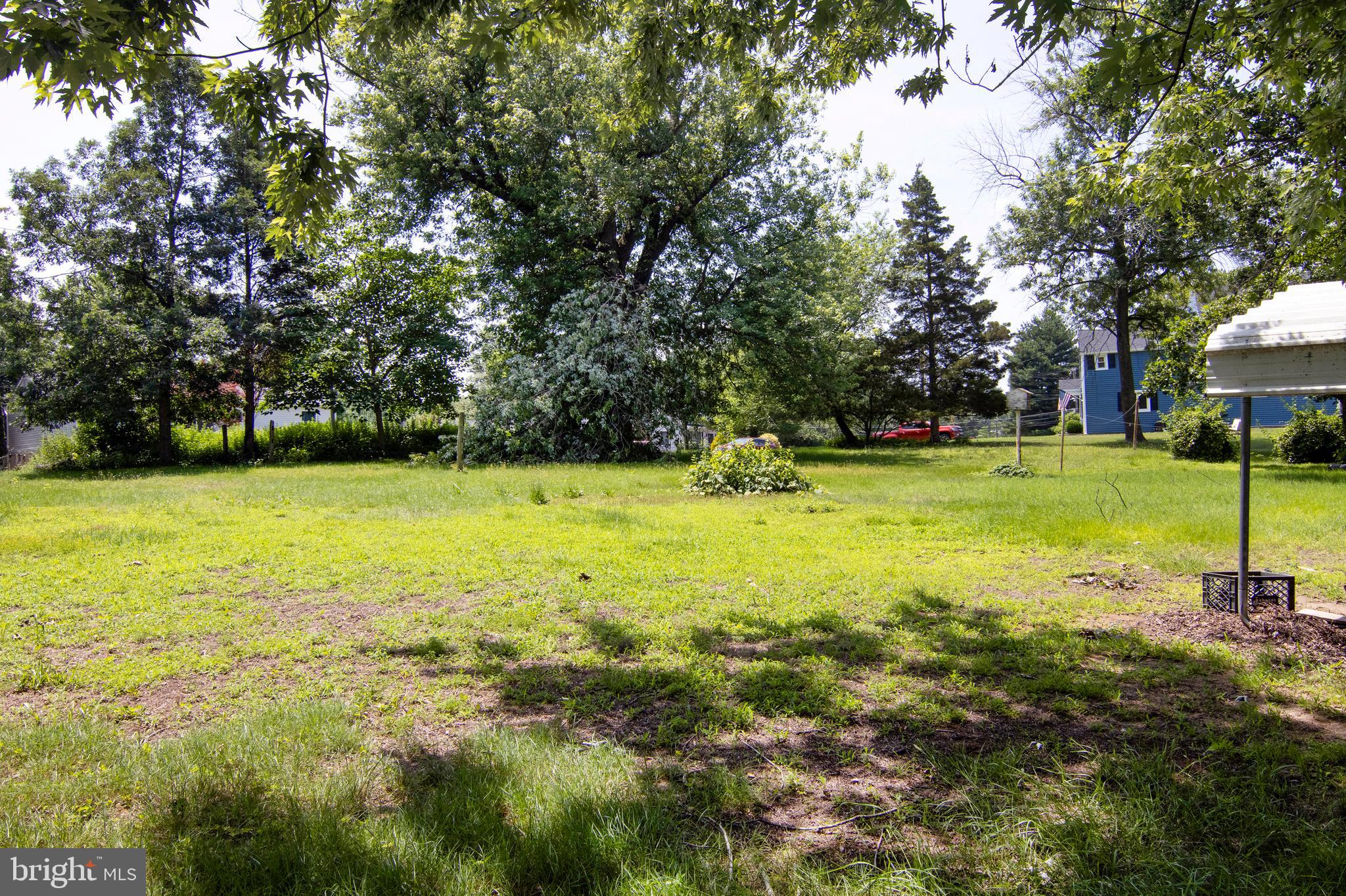 266 Passaic Avenue Thorofare, NJ 08086 - Photo 46 of 53 a view of a swimming pool and trees in the background