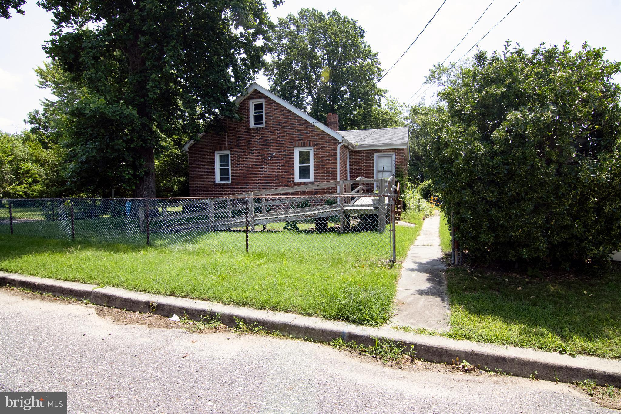 266 Passaic Avenue Thorofare, NJ 08086 - Photo 5 of 53 a front view of a house with a yard