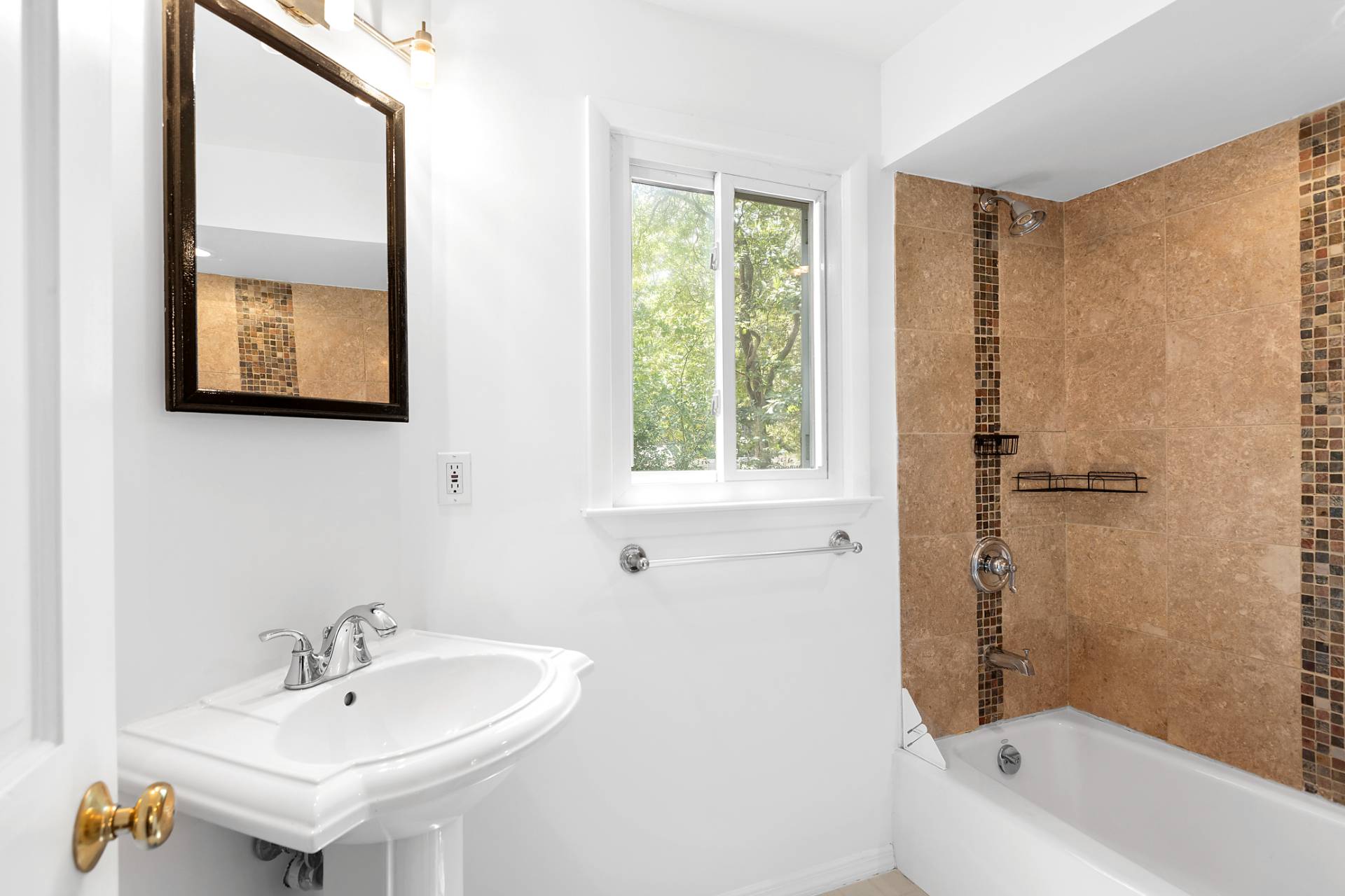 803 Noyack Road Southampton, NY 11968 - Photo 12 of 20 a bathroom with a sink and a bathtub