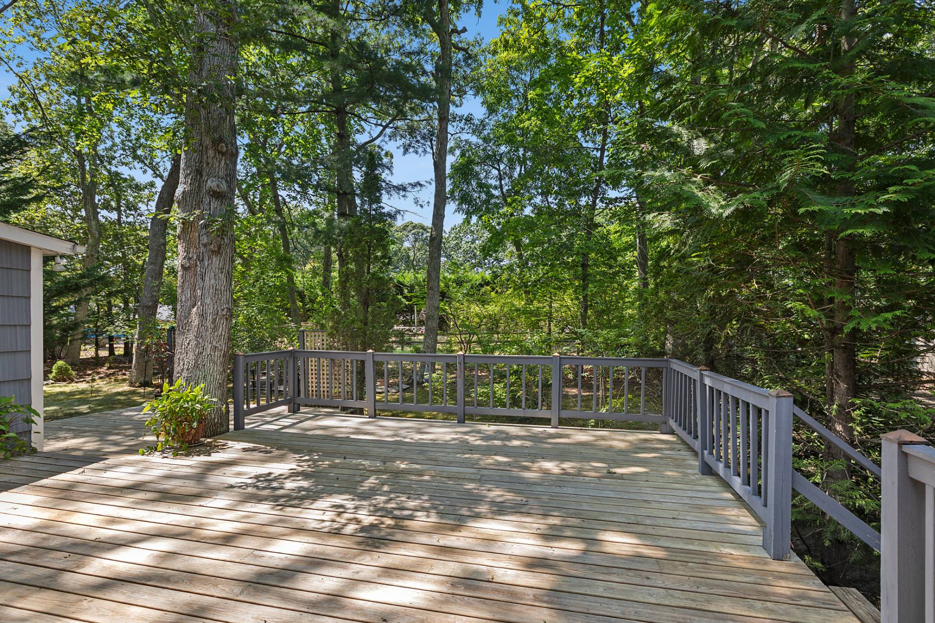 803 Noyack Road Southampton, NY 11968 - Photo 18 of 20 a deck view with a wooden fencing