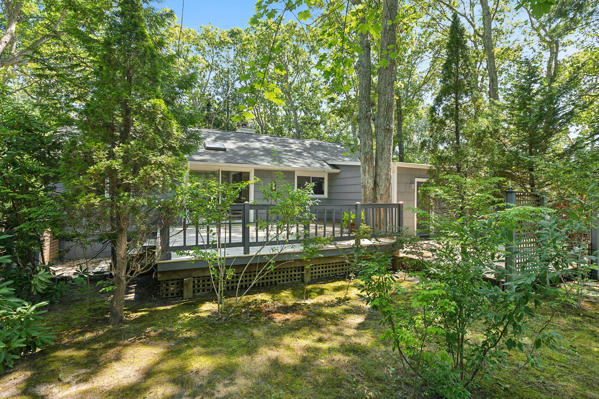 803 Noyack Road Southampton, NY 11968 - Photo 19 of 20 front view of house with a yard