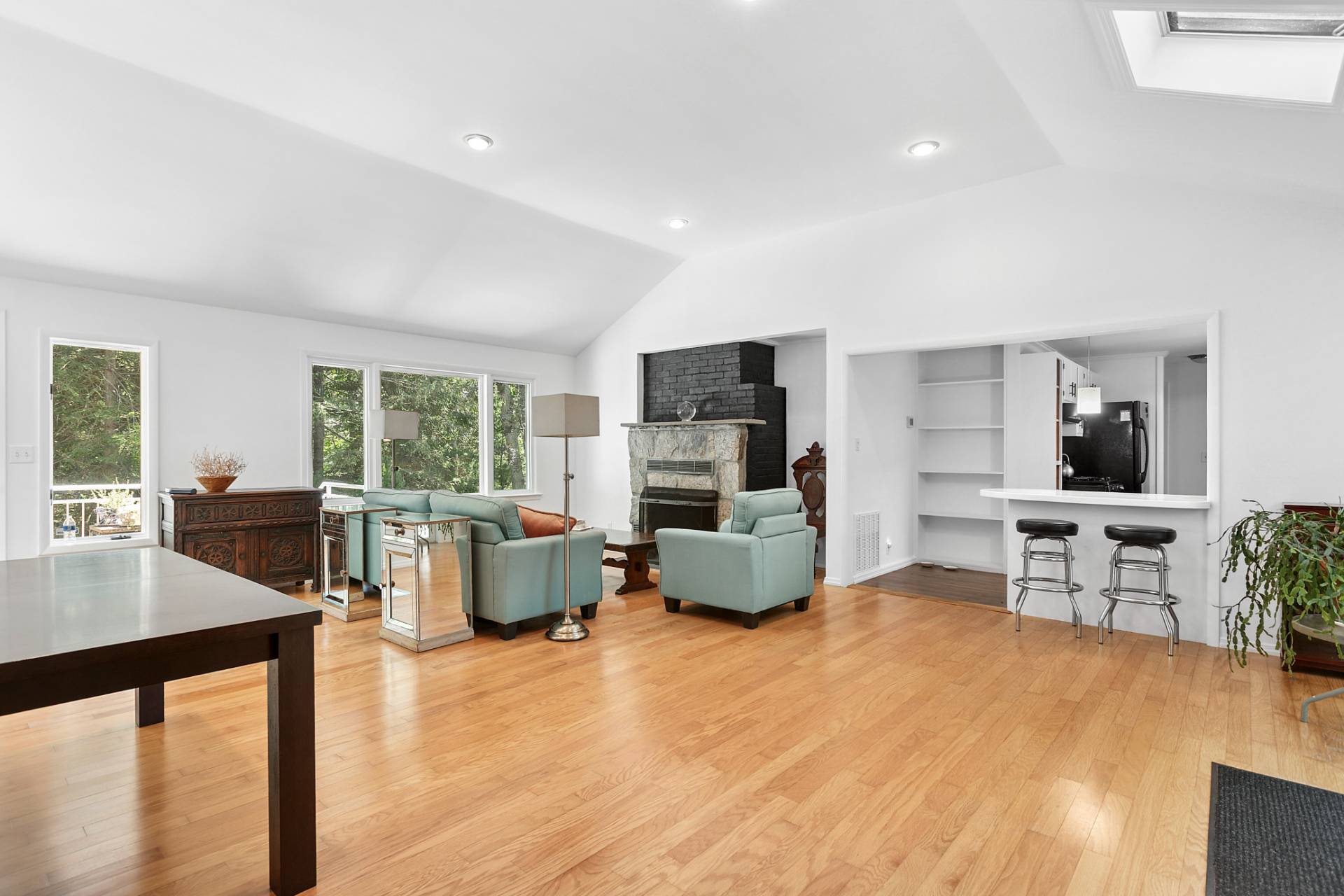 803 Noyack Road Southampton, NY 11968 - Photo 6 of 20 a living room with furniture and a table