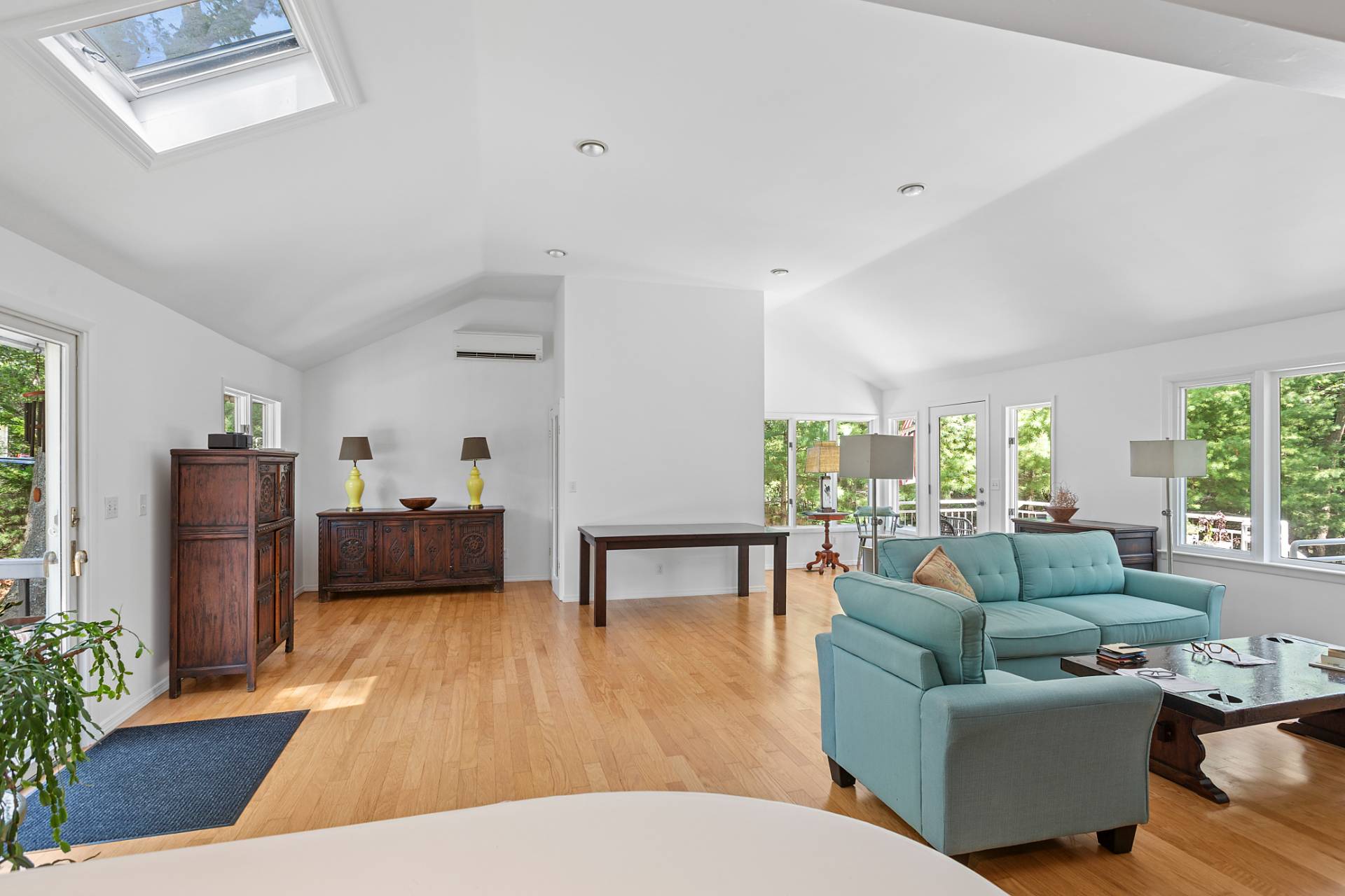 803 Noyack Road Southampton, NY 11968 - Photo 7 of 20 a living room with furniture and a table