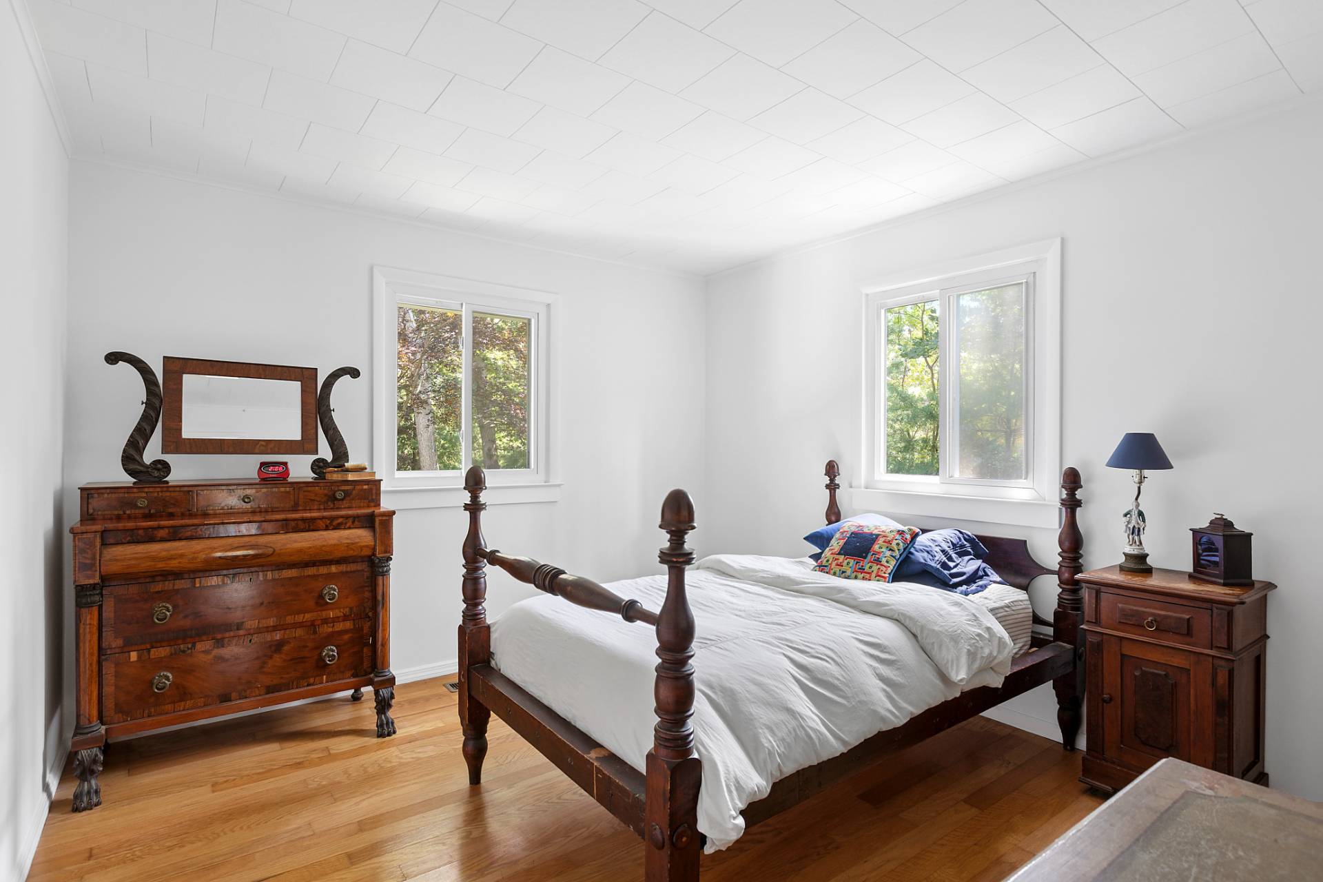 803 Noyack Road Southampton, NY 11968 - Photo 10 of 20 a bedroom with a bed and a window