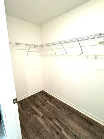 a view of a room with racks on the wall