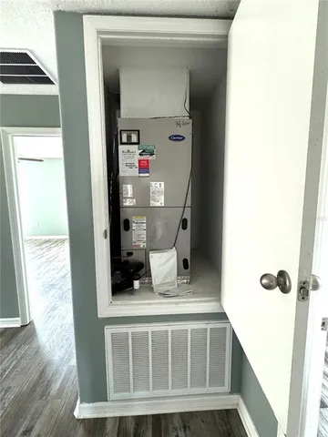 a view of an empty room with a window