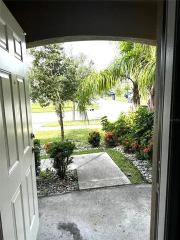 a view of a yard with an outdoor space