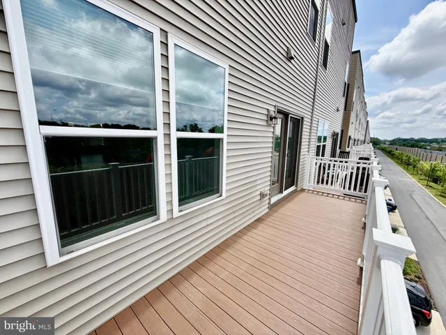a balcony view with a lots of windows
