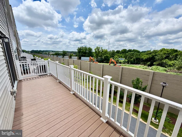 a bathroom with a sink mirror and toilet
