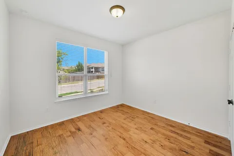 a view of a backyard with a garden and plants