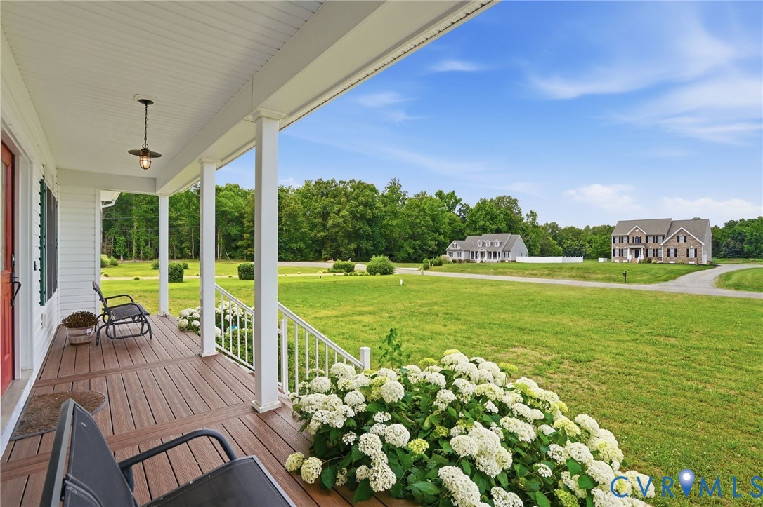 5305 Wellington Ridge Road Richmond, VA 23231 - Photo 10 of 67 Front porch with wood-finish decking and white rai