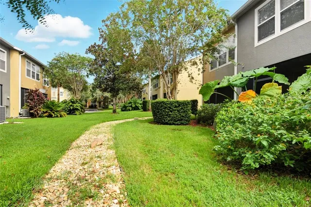 a view of a garden with a fountain