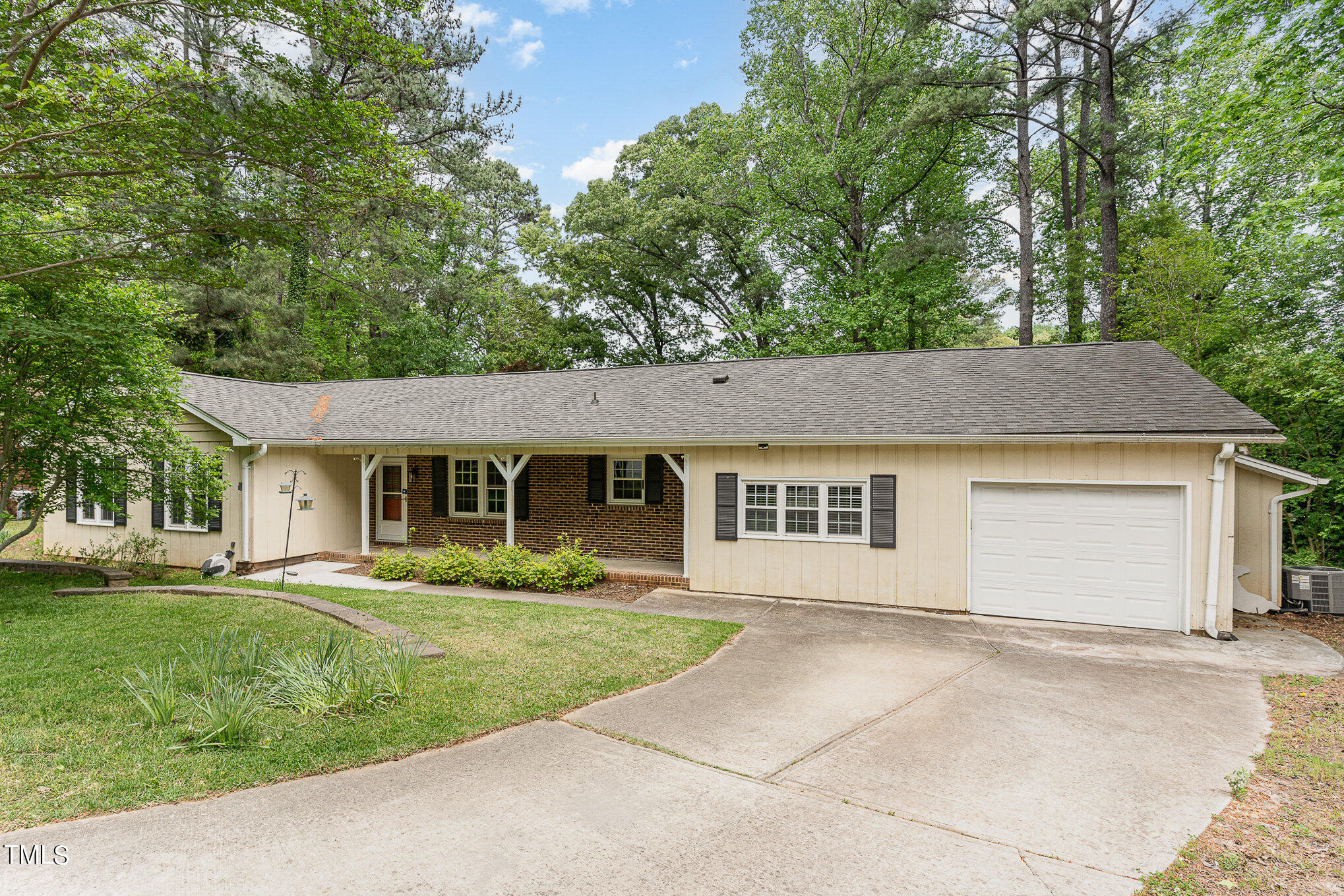 4100 Stranaver Place Raleigh, NC 27612 - Photo 11 of 43 front view of house with a yard