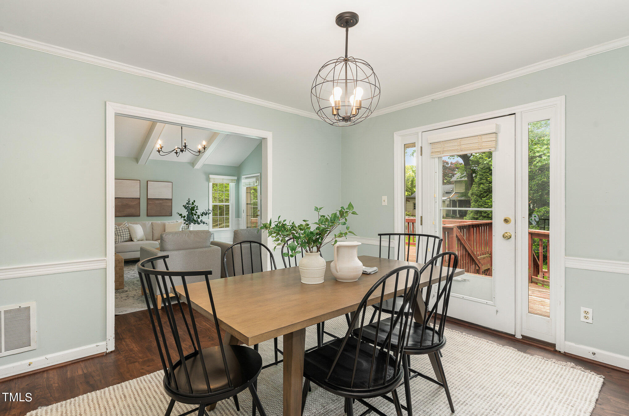 4100 Stranaver Place Raleigh, NC 27612 - Photo 3 of 43 a view of a dining room with furniture window and wooden floor