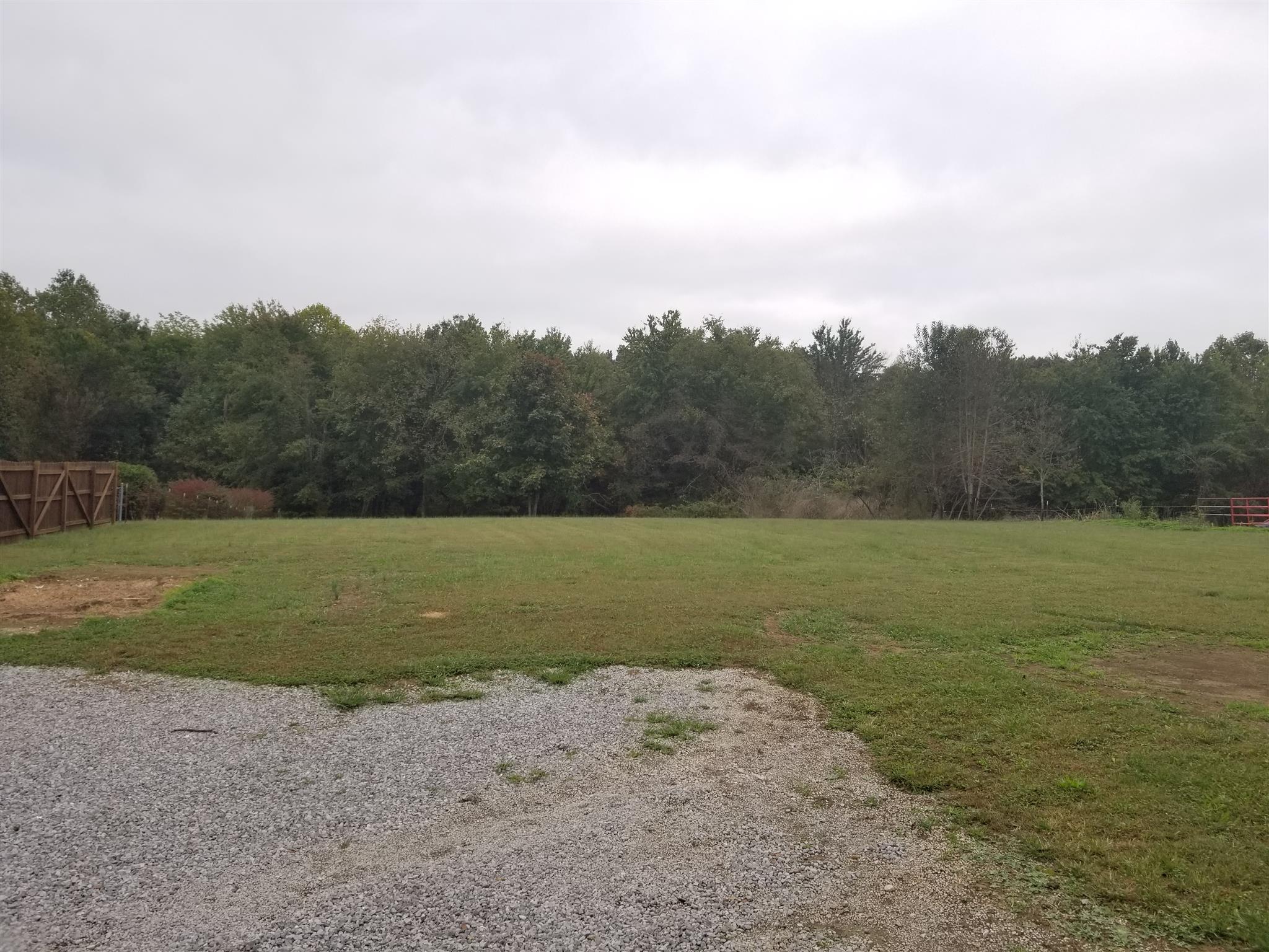 230 Hester Road Portland, TN 37148 - Photo 4 of 4 a view of a field with an trees