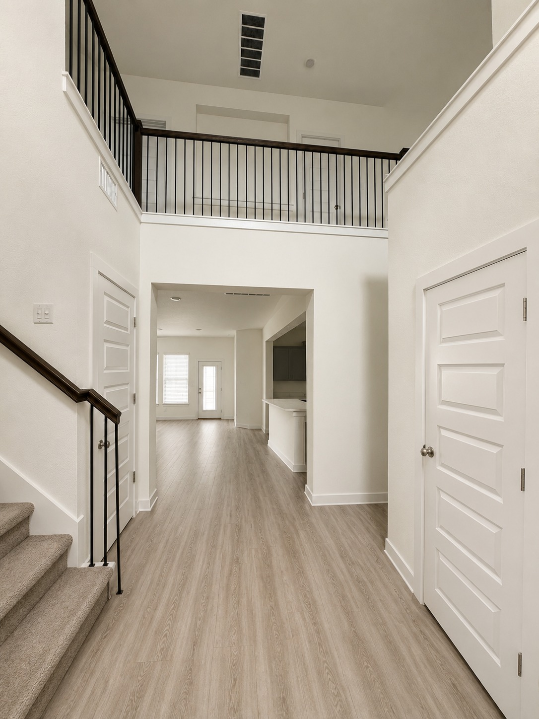 1213 Bryson Rdg Trail Leander, TX 78641 - Photo 4 of 16 A grand two-story entryway creates an inviting transition to the main living areas.
