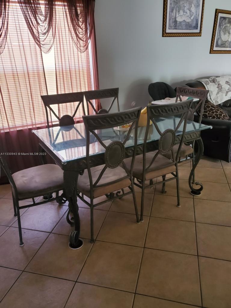 Davie Davie, FL 33325 - Photo 11 of 13 a view of a livingroom with furniture and sitting area