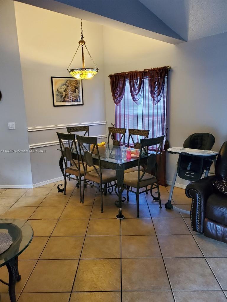 Davie Davie, FL 33325 - Photo 5 of 13 a view of a dining room with furniture