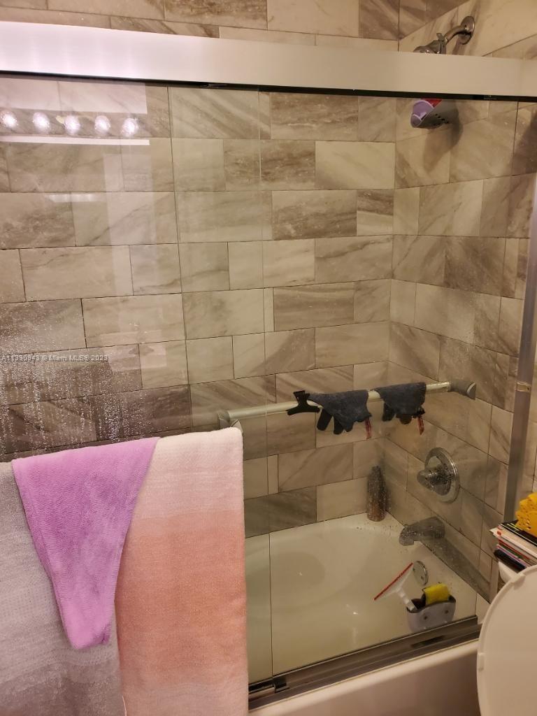 Davie Davie, FL 33325 - Photo 7 of 13 a bathroom with a bathtub