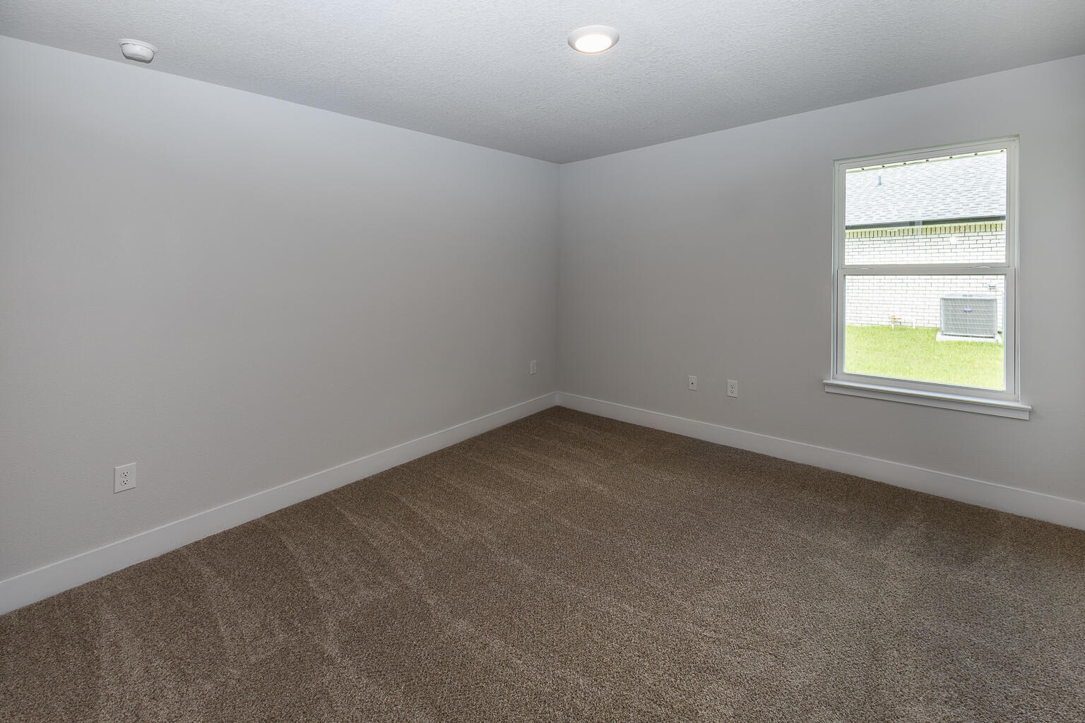 5303 Zenith Lane Milton, FL 32583 - Photo 20 of 21 an empty room with a window