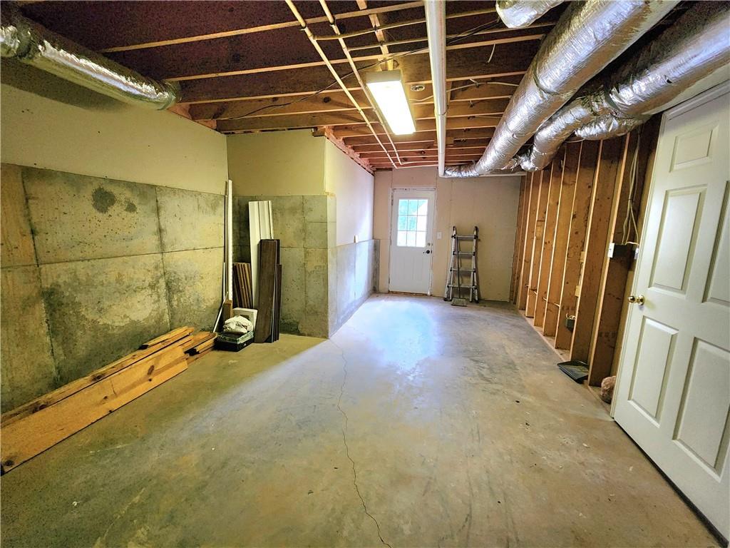 1645 Rushing River Way Suwanee, GA 30024 - Photo 33 of 38 a view of hallway with stairs