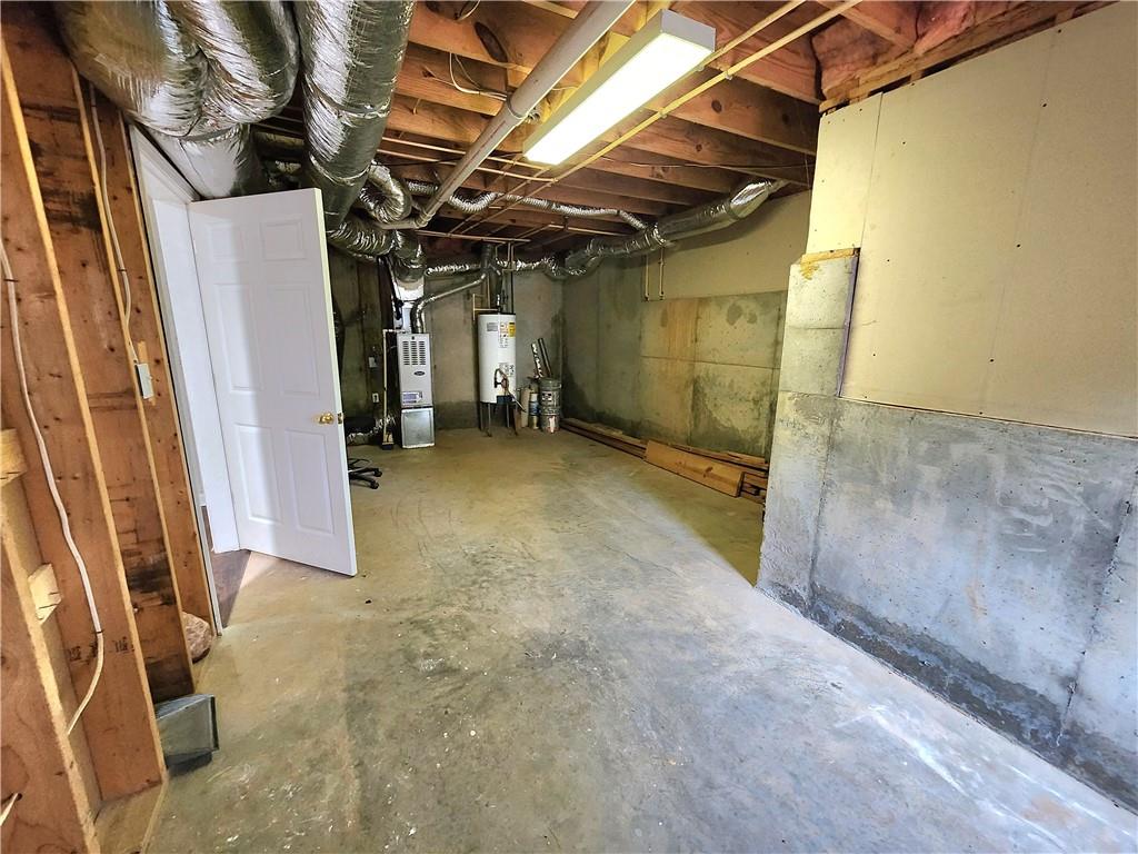 1645 Rushing River Way Suwanee, GA 30024 - Photo 34 of 38 a view of a room with wooden walls