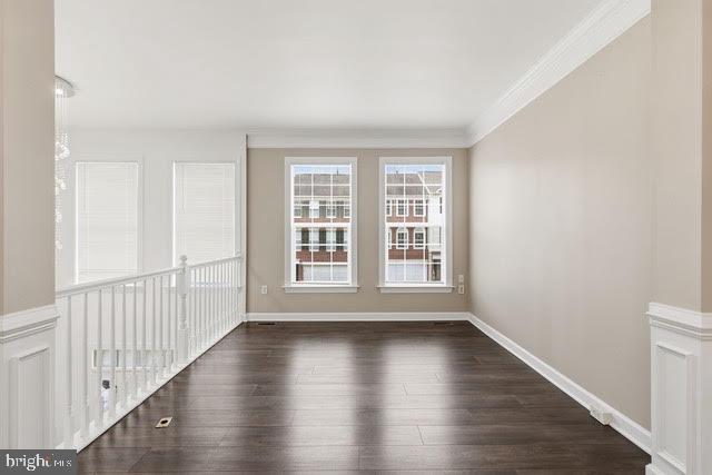 15683 Avocet Loop Woodbridge, VA 22191 - Photo 16 of 38 wooden floor in an empty room with a window