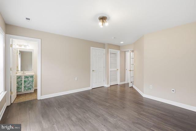 15683 Avocet Loop Woodbridge, VA 22191 - Photo 17 of 38 a view of an empty room with wooden floor