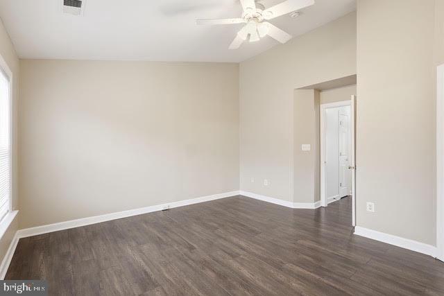 15683 Avocet Loop Woodbridge, VA 22191 - Photo 26 of 38 an empty room with wooden floor and fan