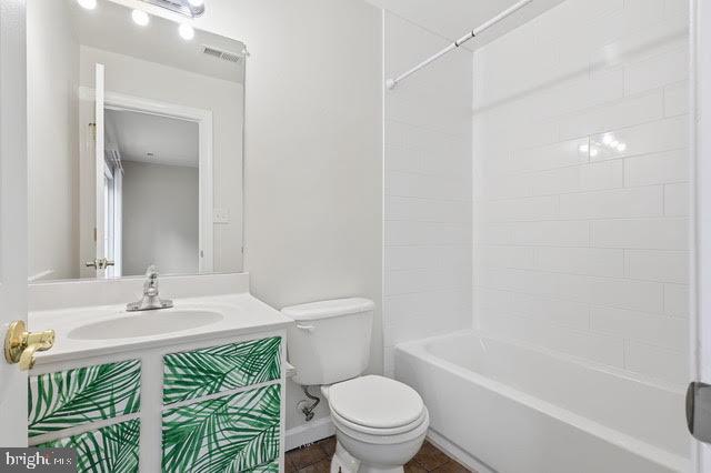 15683 Avocet Loop Woodbridge, VA 22191 - Photo 29 of 38 a bathroom with a sink a toilet and shower